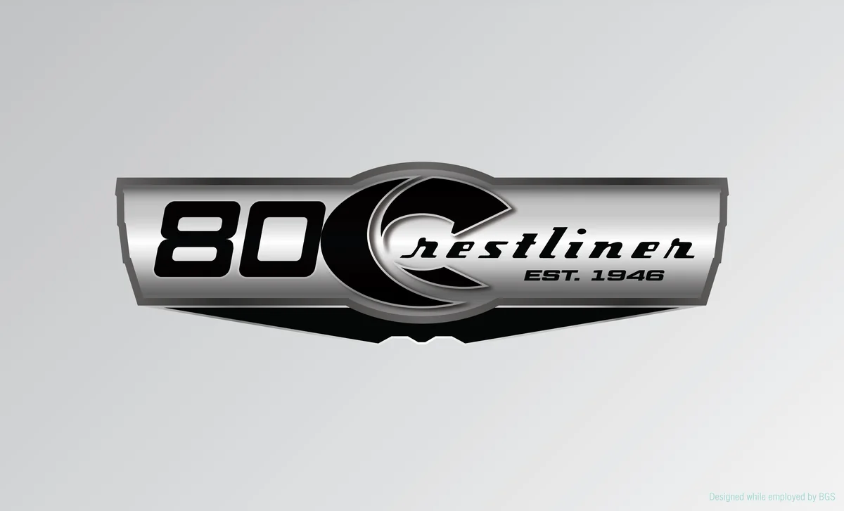 80th anniversary emblem: Chrome anniversary badge with script wordmark