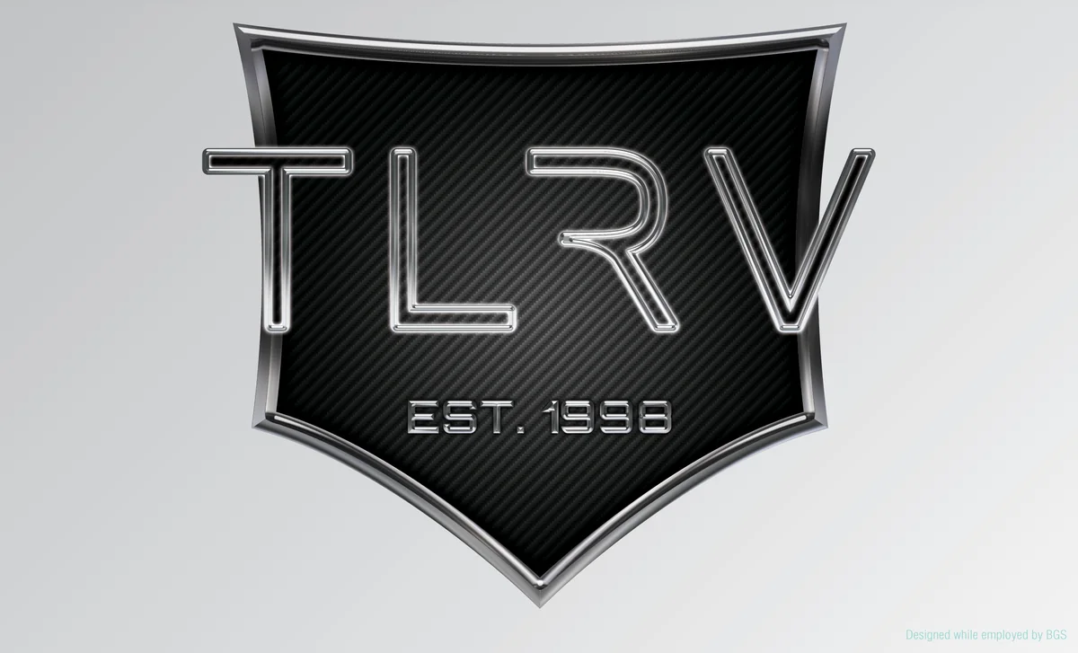 Shield emblem: Chrome-edged shield on carbon fiber